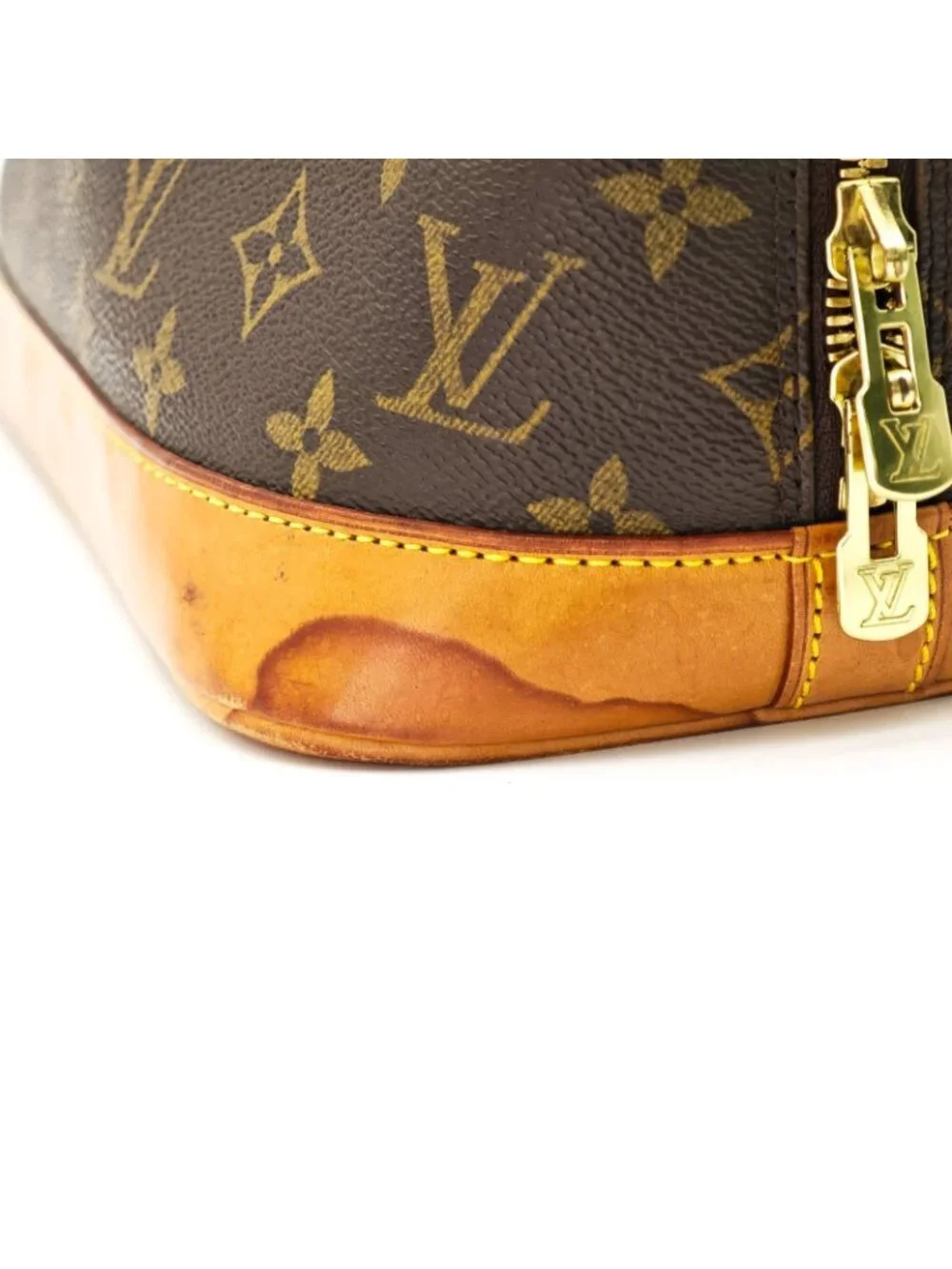 Louis Vuitton Alma Monogram Canvas Handbag